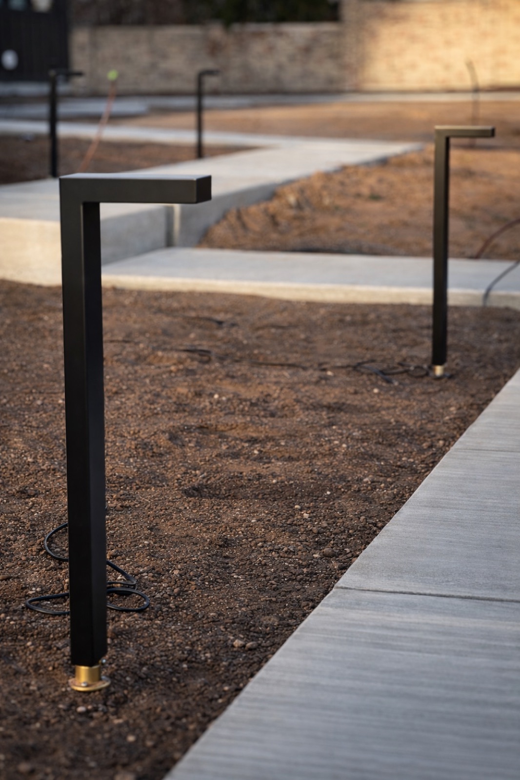 Modern bollard pathway lighting installation